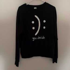You decide cute size medium black crew neck with white design.